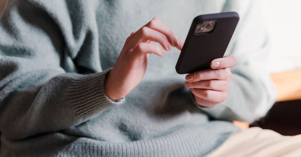 woman mindless scrolling on phone