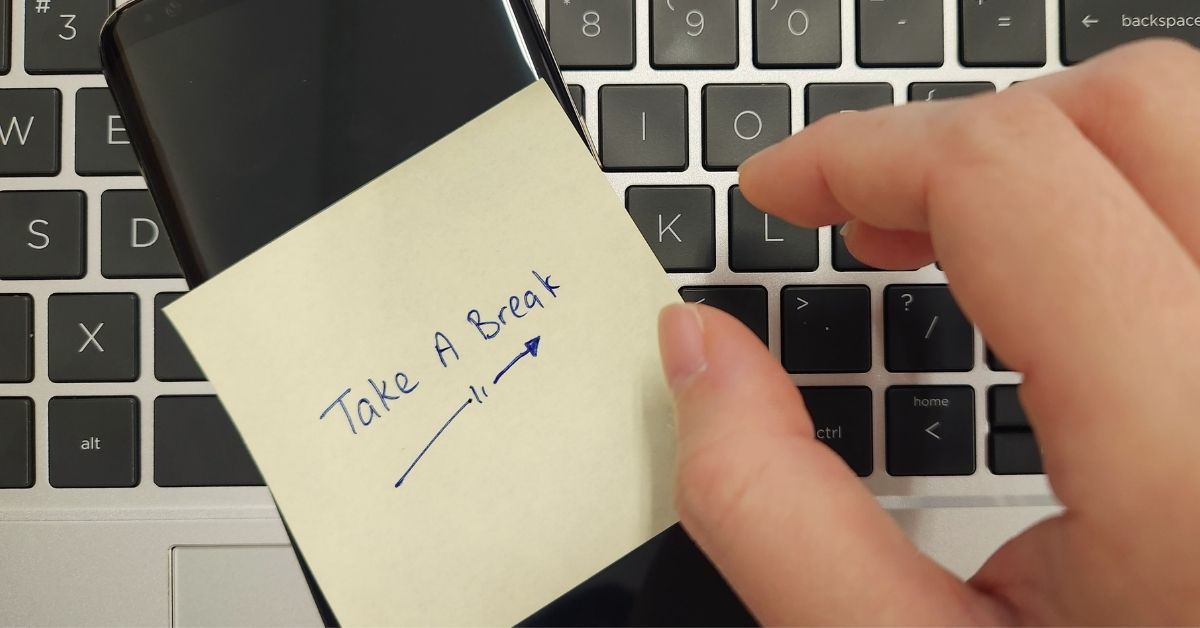 sticky note written with take a break and an arrow