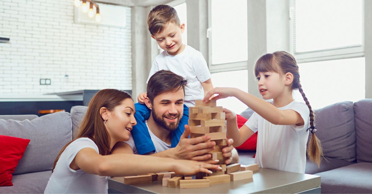Family enjoying a game together laughing